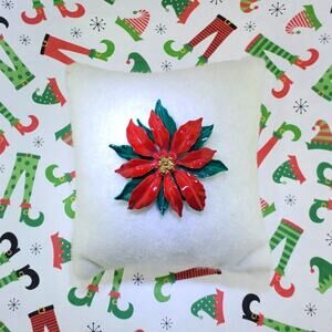 Vintage poinsettia lapel pin Festive Christmas brooch